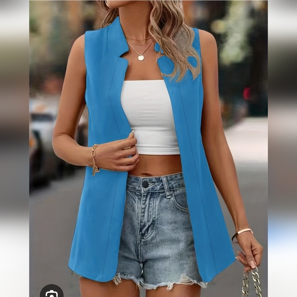 Light Blue Sleeveless open vest. Perfect Layering piece